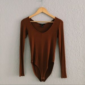 (SOLD) Burnt orange long-sleeve bodysuit.